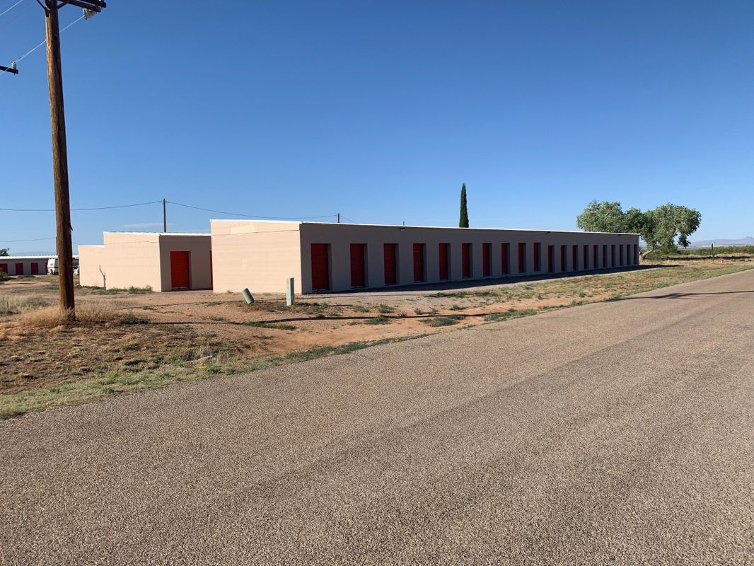 Long building with red doors
