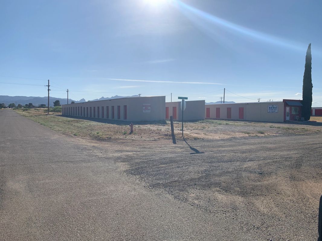 Rural road beside storage facility